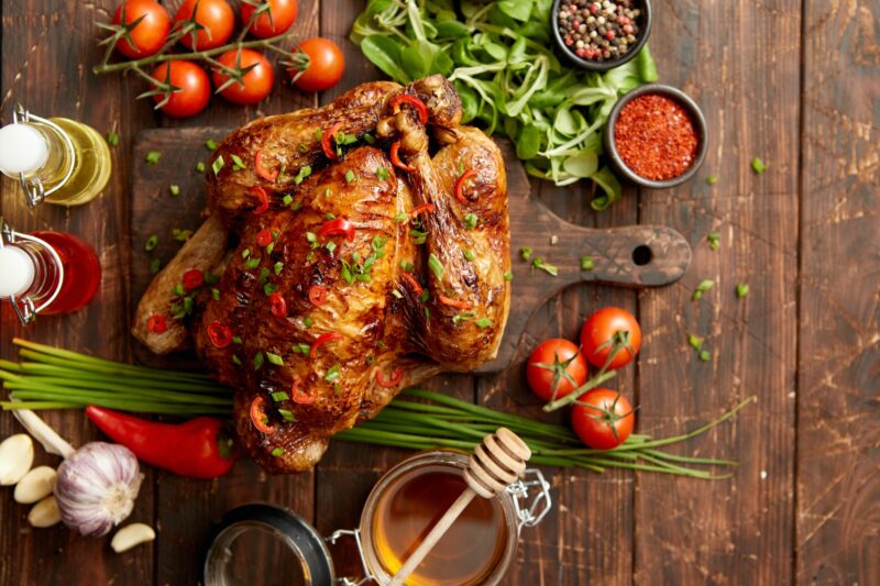 Roasted whole chicken or turkey served with chilli pepers and chive