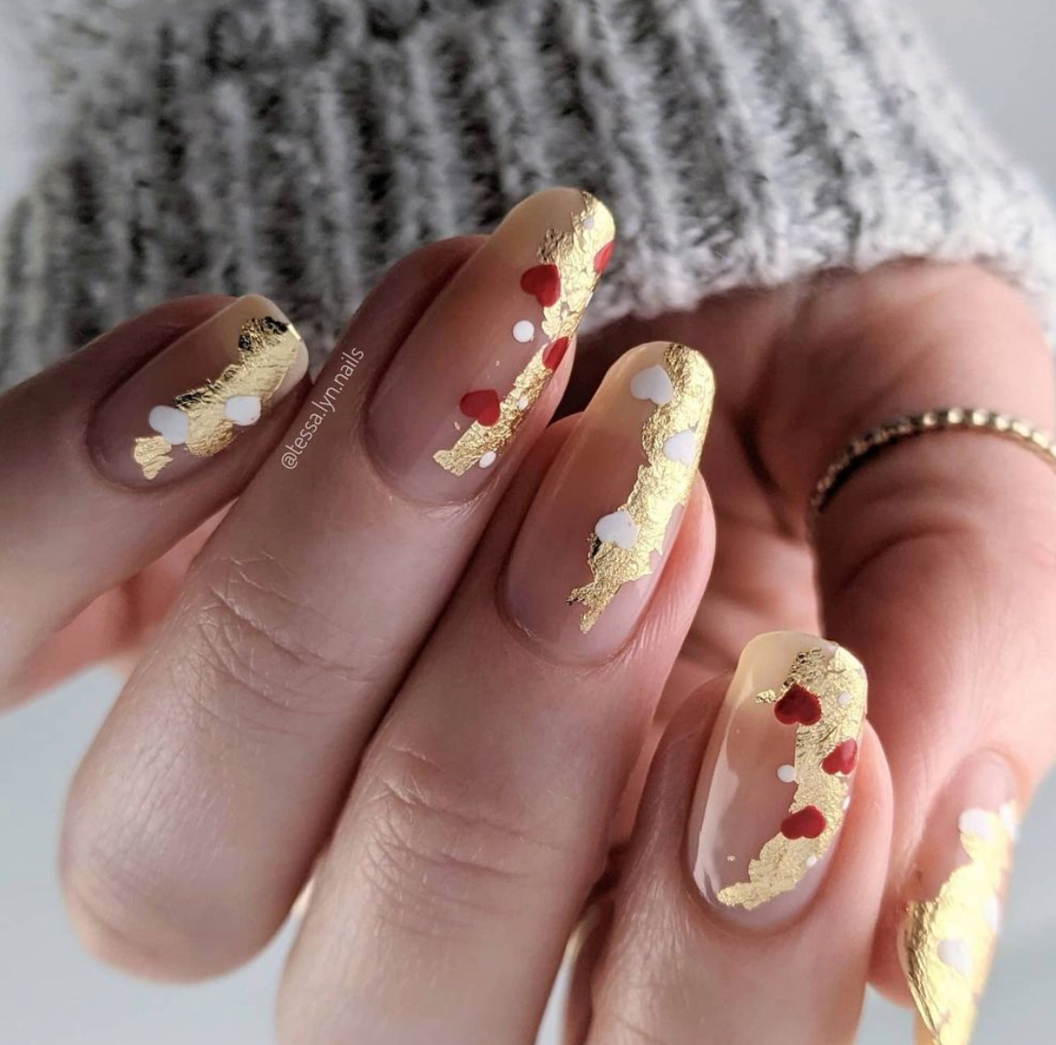 Red And Gold Decorated Nail