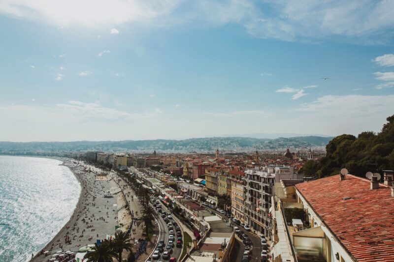 Panoramic view of Nice coastline and beach with blue sky, France