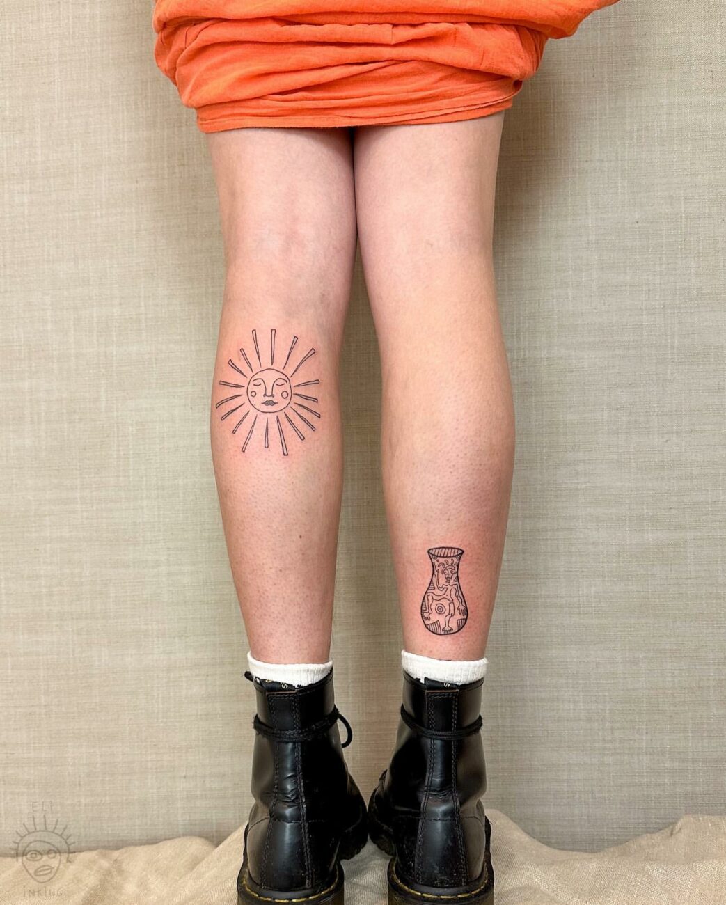 female calf tattoo