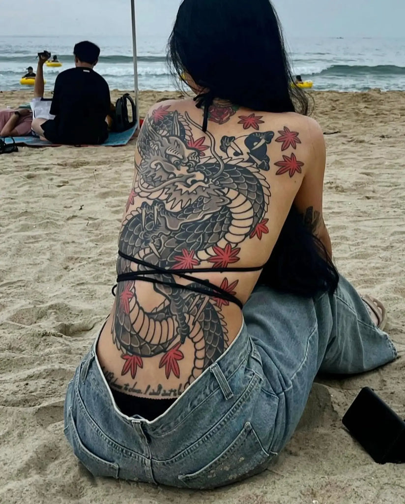 Female tattoo on the back