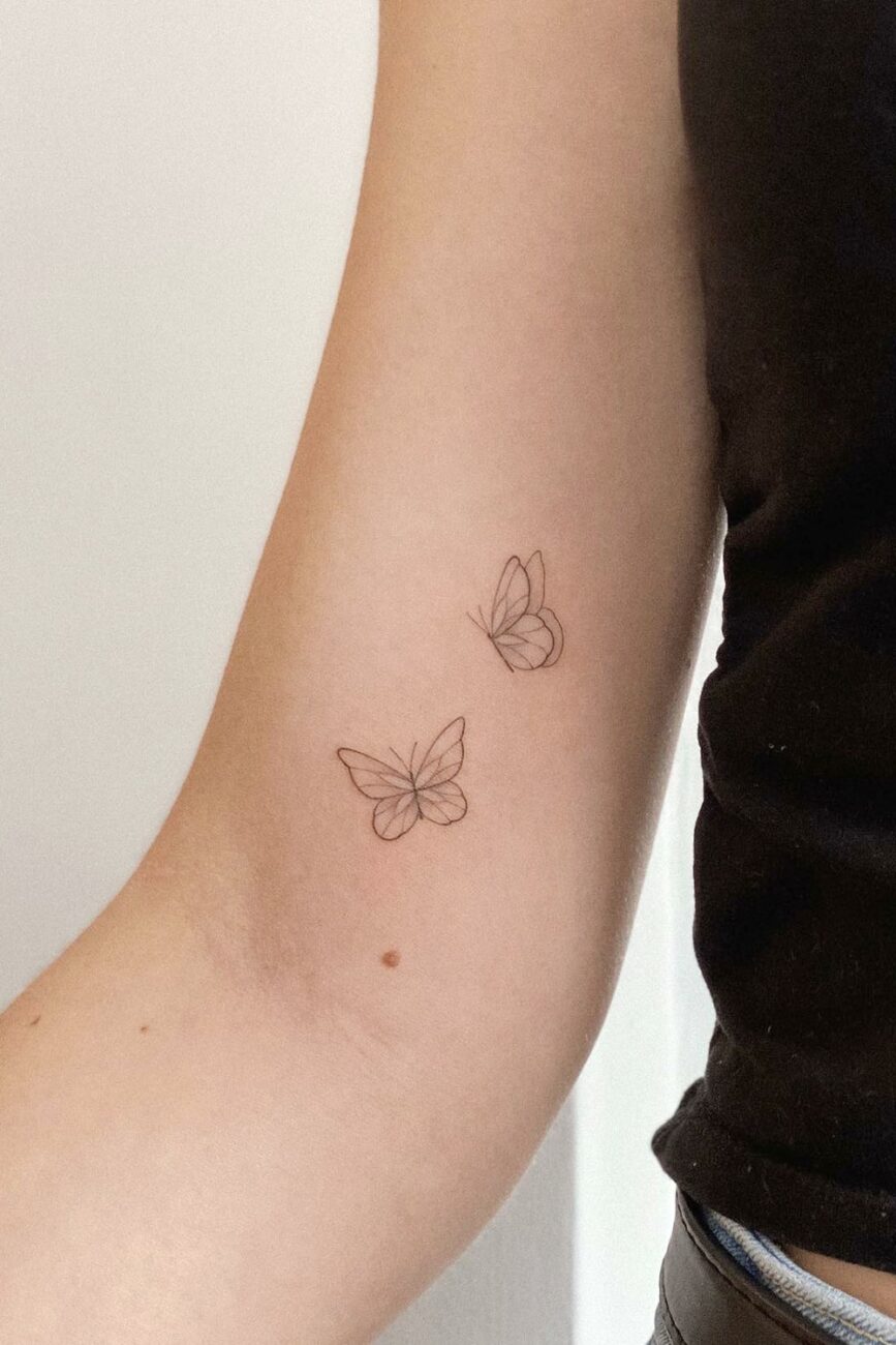 Tatuagem de Borboleta no Braço Delicada