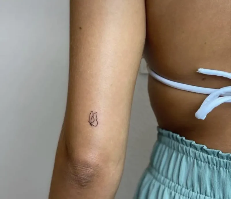 small female tattoo