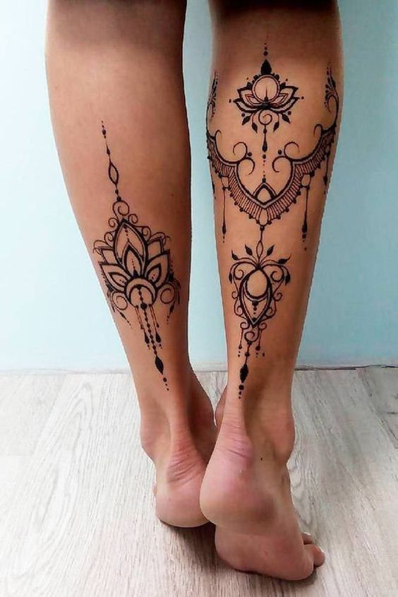 female calf tattoo