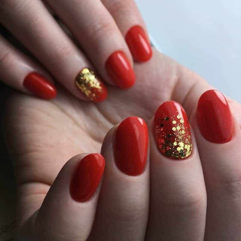 Red And Gold Decorated Nail