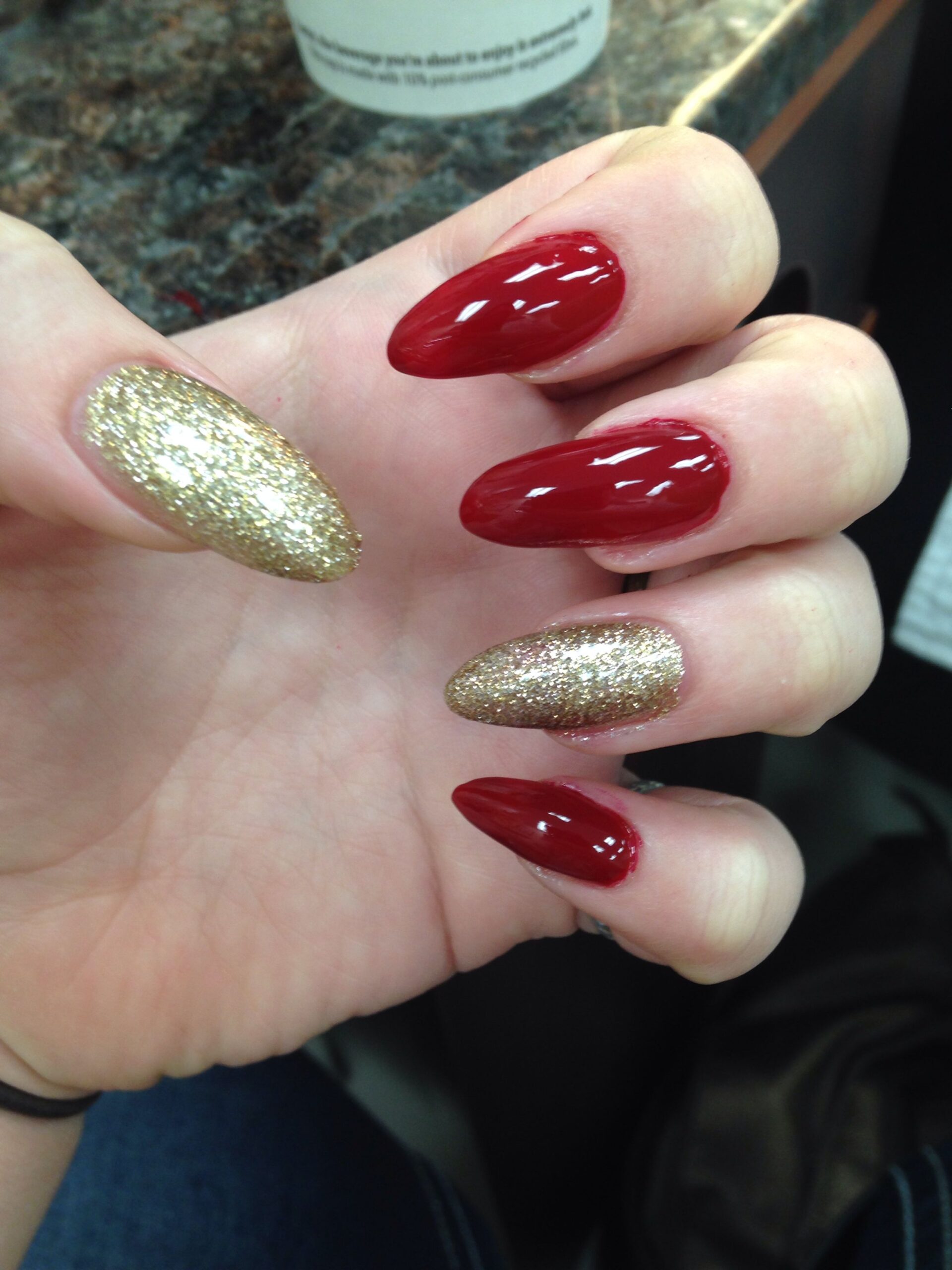 Red And Gold Decorated Nail