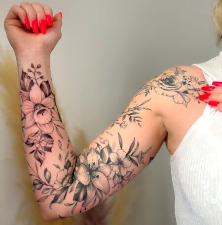 tatuagem-feminina-braco-fechado-flores