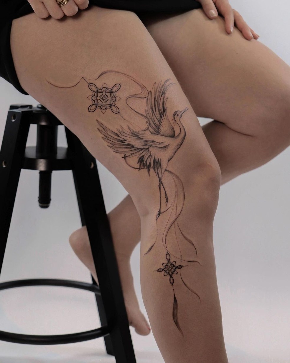 tatuagem feminina na perna