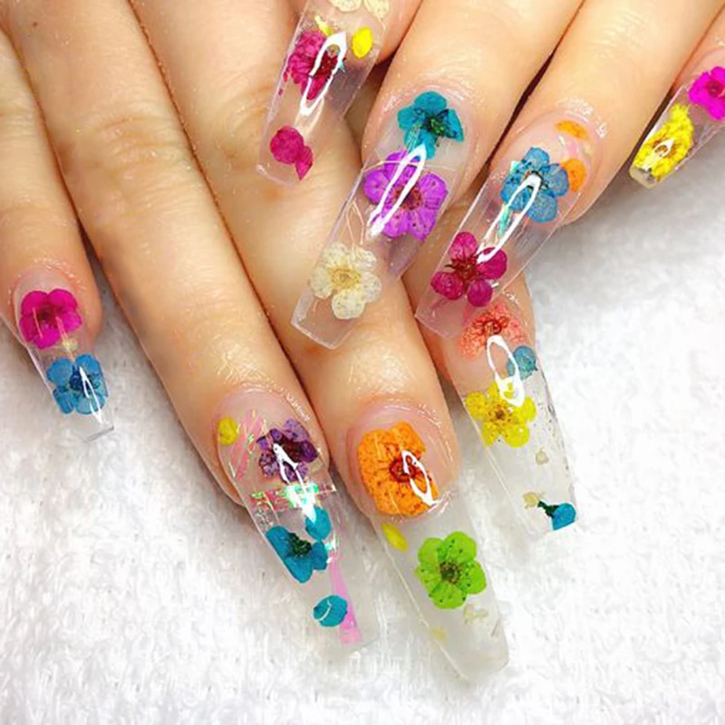 nail with encapsulated dried flower