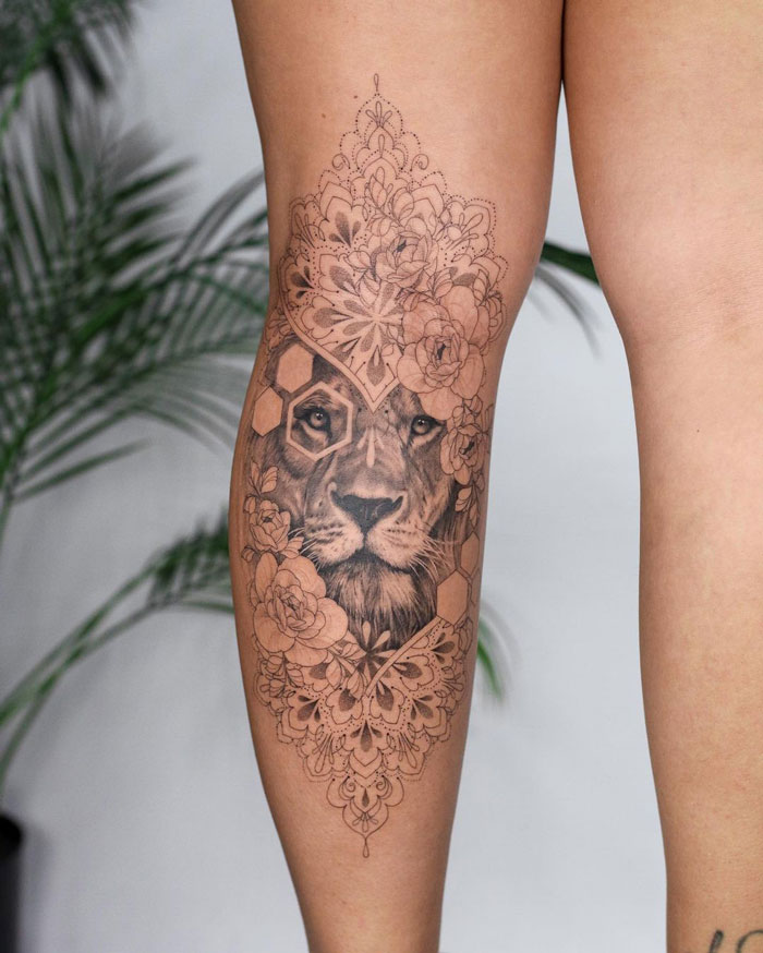 female calf tattoo