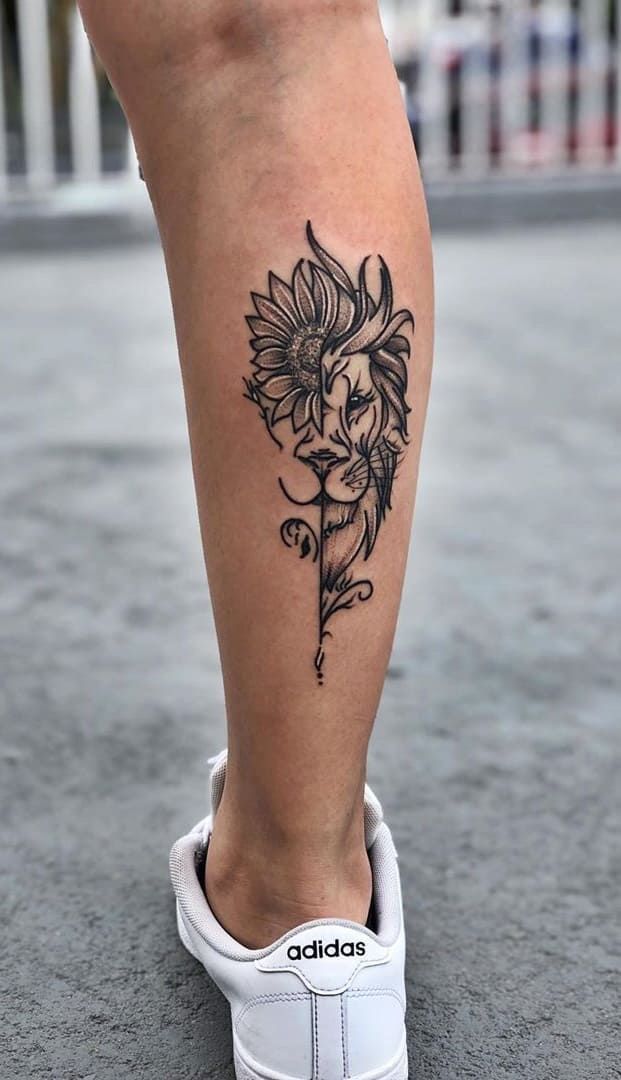 female calf tattoo