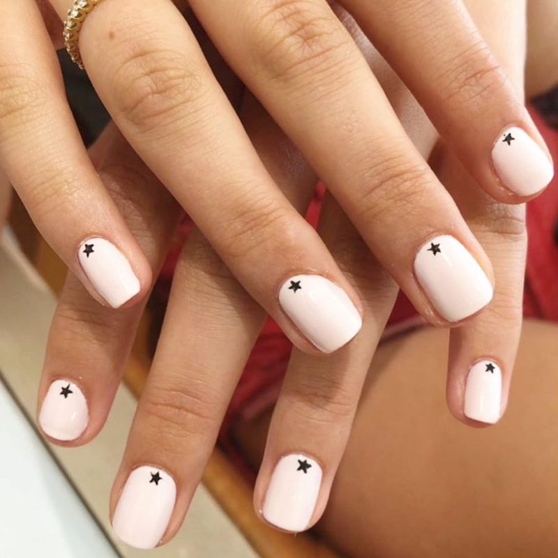 White Decorated Nail