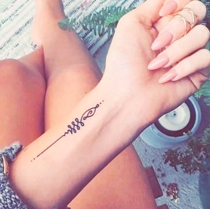 small female tattoo