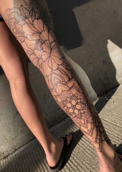 female calf tattoo