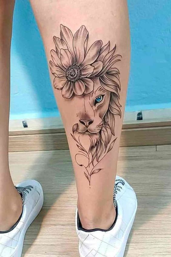 female calf tattoo