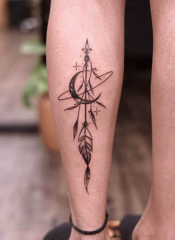 female calf tattoo