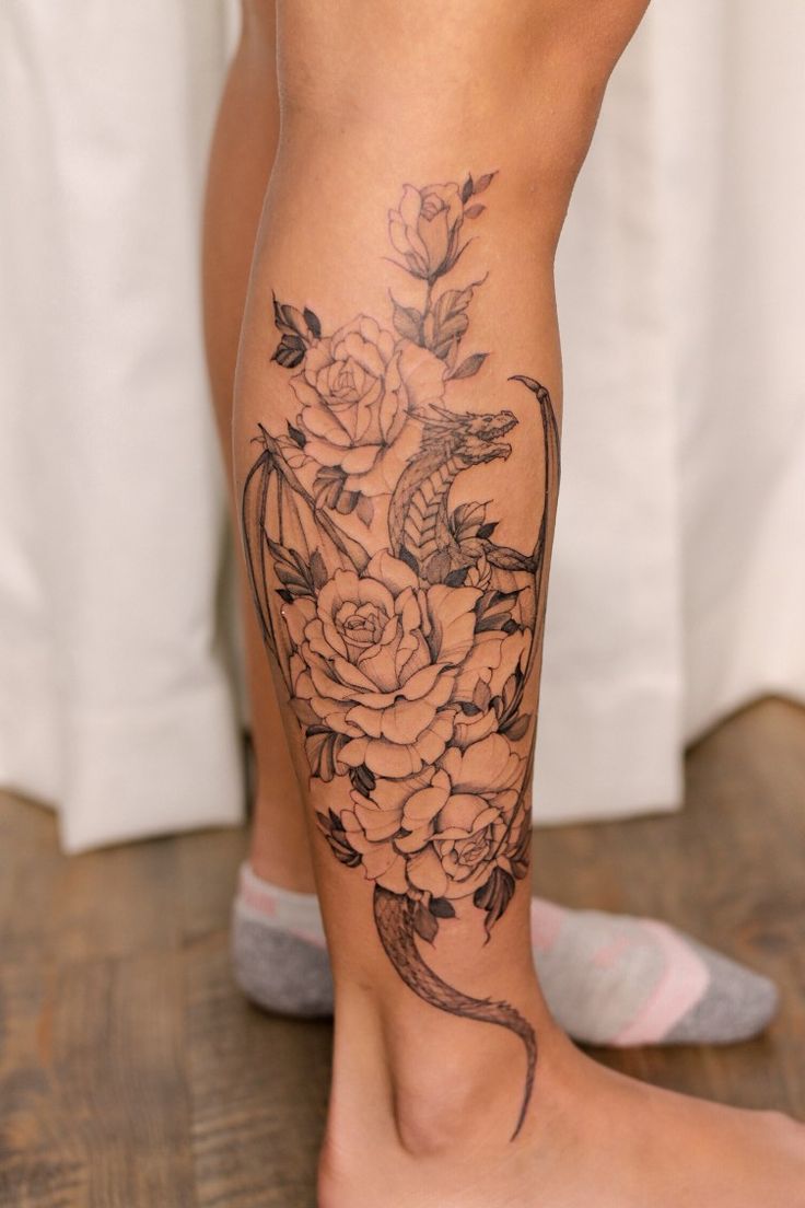 female calf tattoo