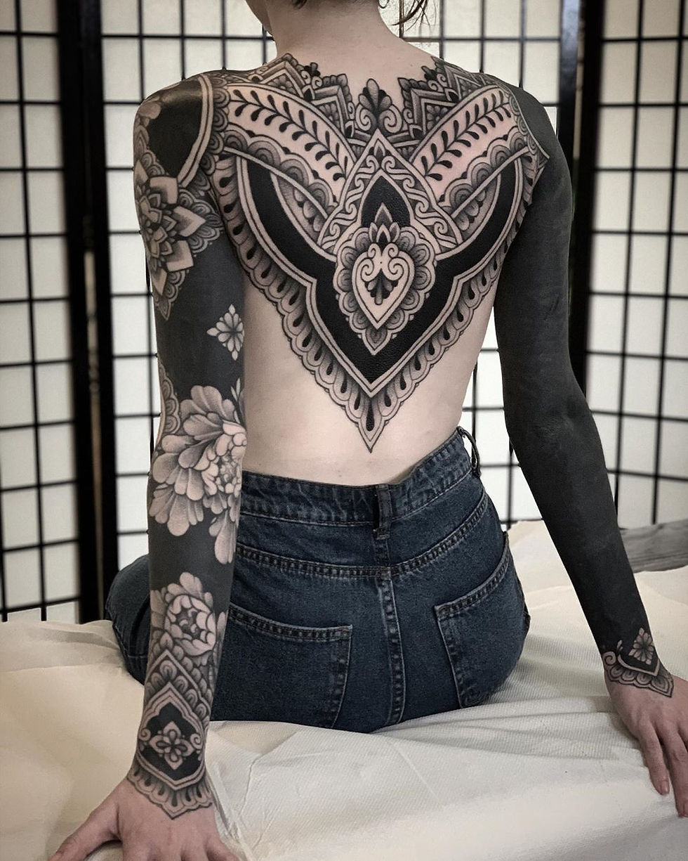 Tatuagem Feminina nas costas