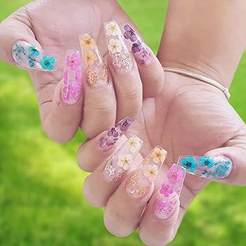 nail with encapsulated dried flower