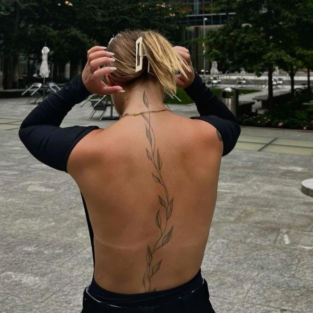 Female tattoo on the back