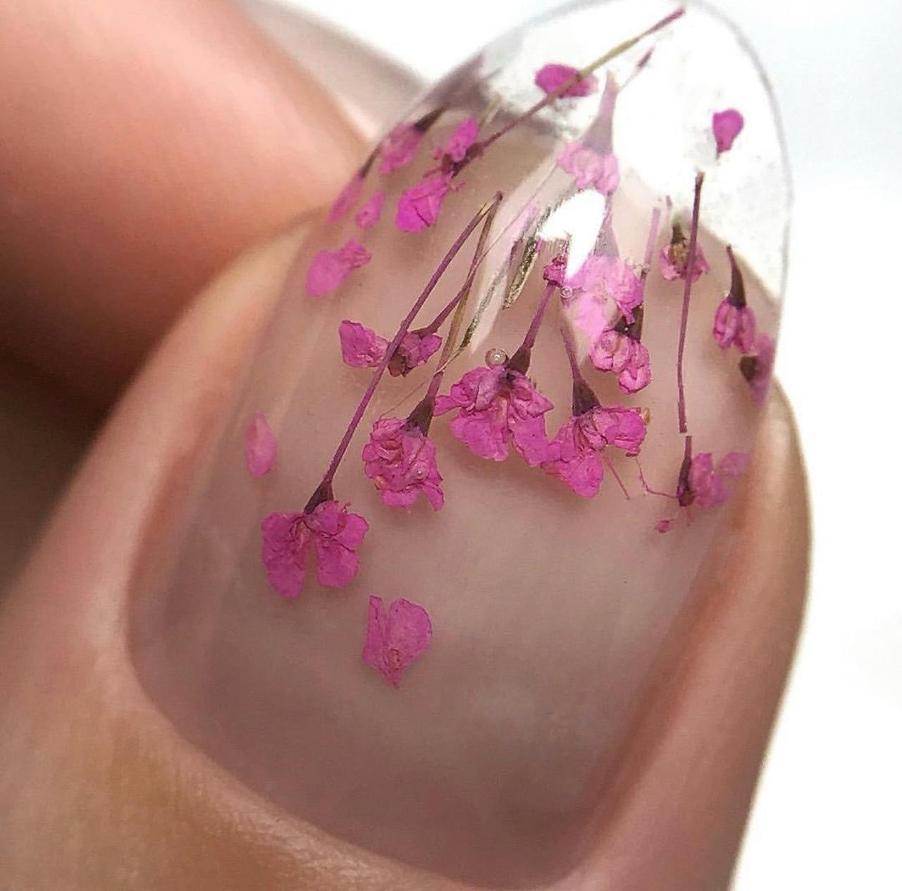 nail with encapsulated dried flower