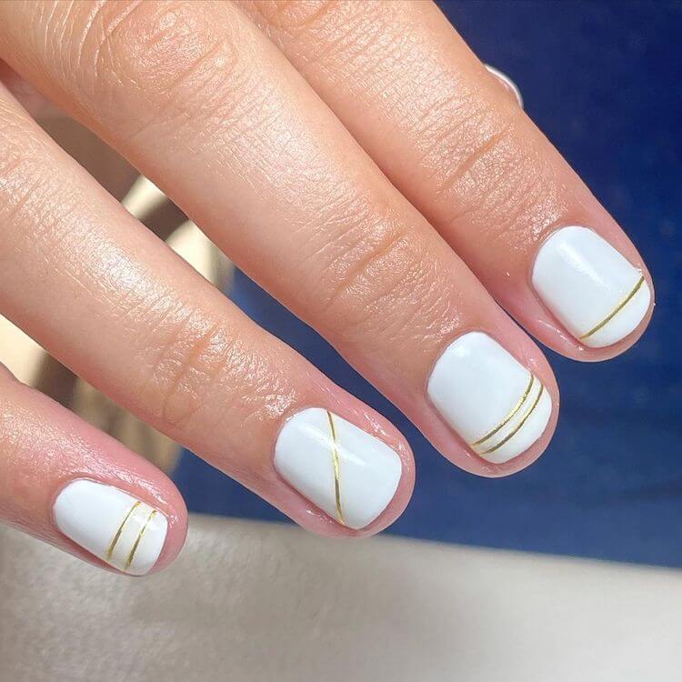 Decorated Nail White With Gold